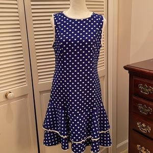 96% polyester 3% Spandex, royal blue  white  sleeveless dress, double ruffle.